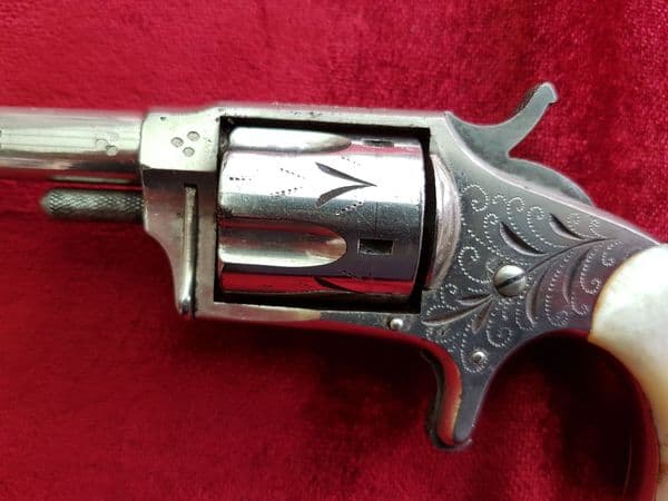 X X X  SOLD X X X  A Hopkins & Allen rimfire revolver with mother-of-pearl grips. c. 1875. Ref 9652.
